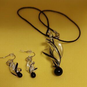 Black and Clear Glass twisted pendant Necklace and matching Earrings